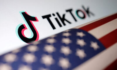 Imagem com bandeira dos EUA e emblema do TikTok (REUTERS/Dado Ruvic)