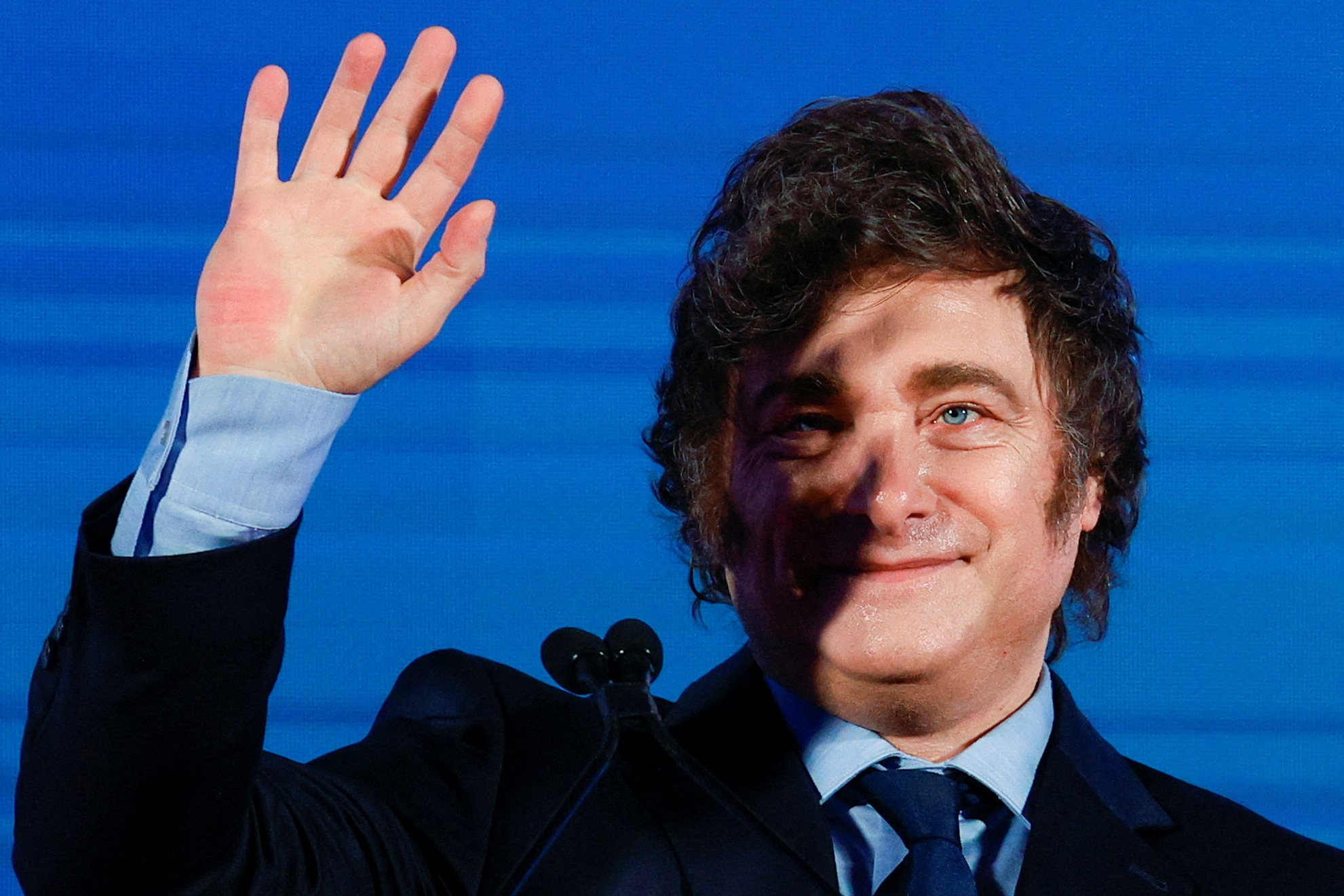 Imagem do presidente Javier Milei durante o evento.