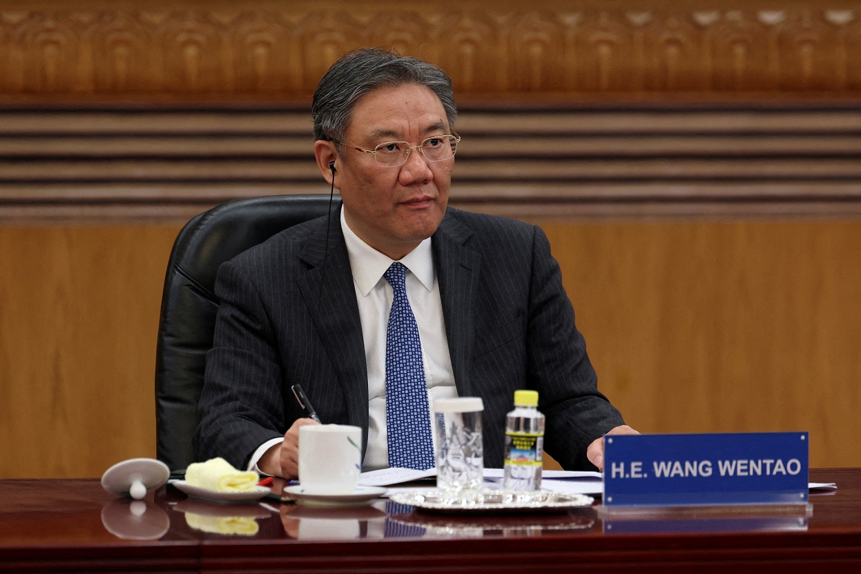 Wang Wentao em reunião com líderes empresariais