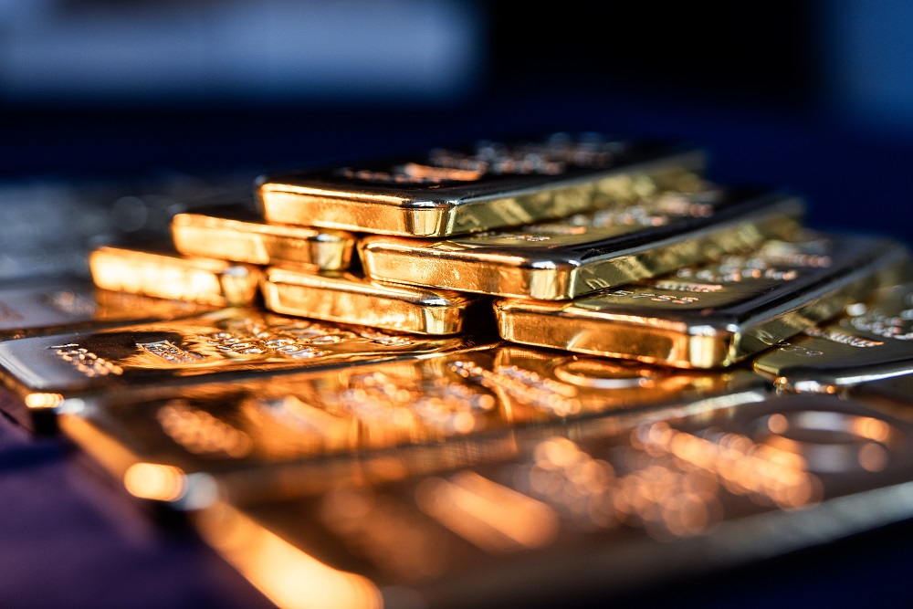 Gold bullion bars stacked