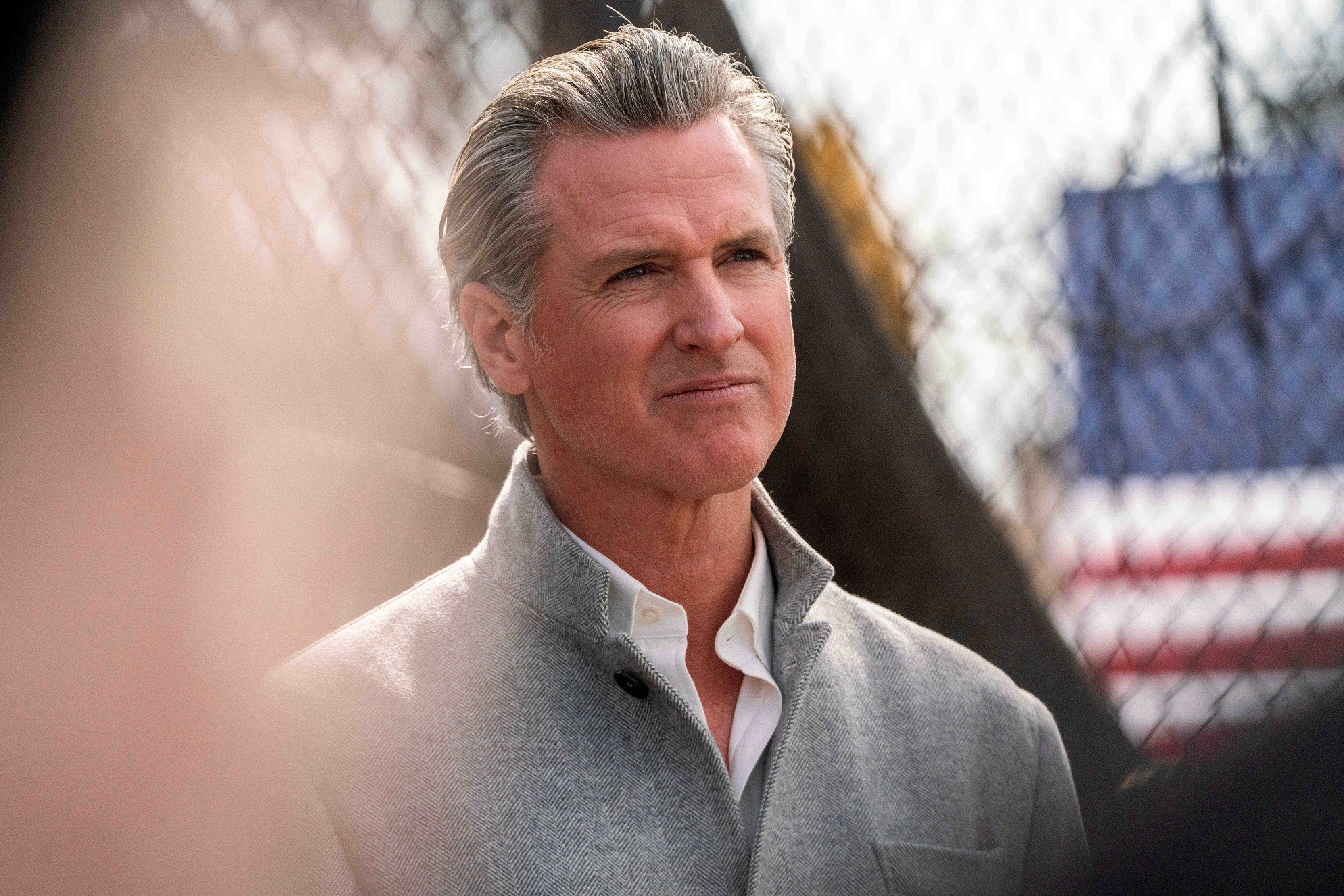Gavin Newsom assessing the damage after the fires