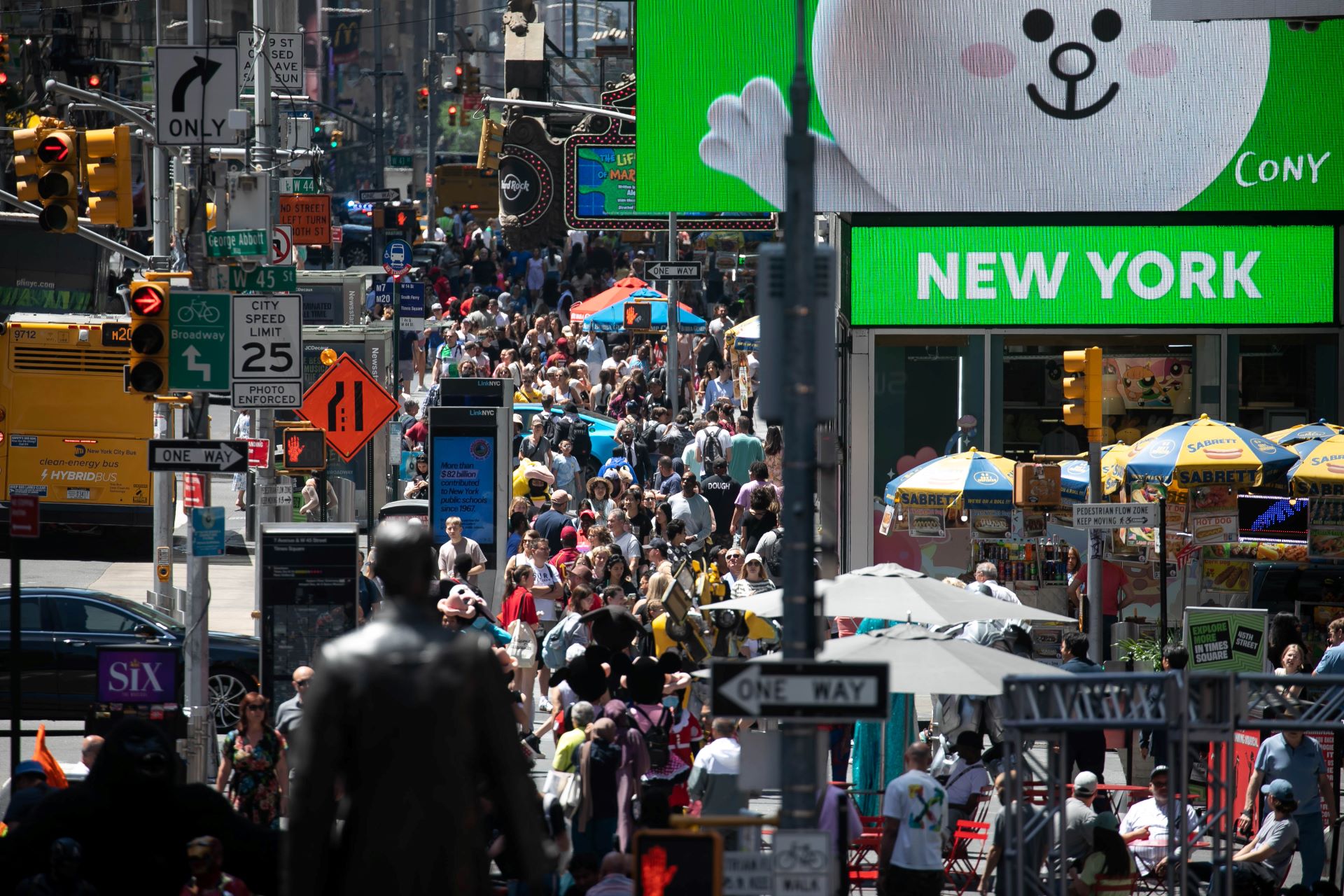 Turistas em Times Square, Nova York.