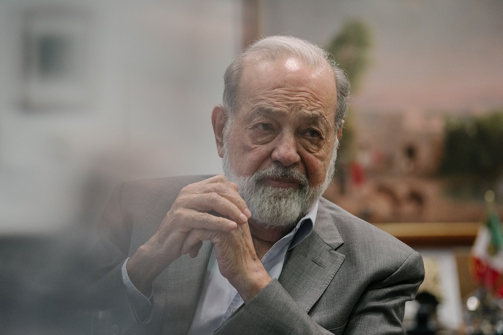 Carlos Slim discussing his business projections.